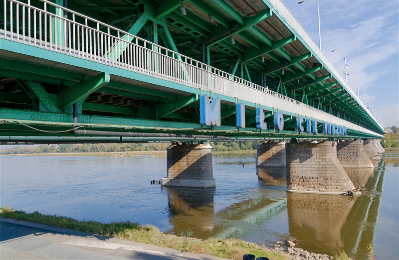 27 - The green-painted Gdański Bridge spanning the Vistula River in Warsaw, Poland
